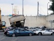 Các xe sang bị nghiền nát ở Manila ngày 6/2. Ảnh: Reuters.