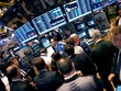 Trader trên sàn 99Kl99 link đăng nhập New York (NYSE). Ảnh: AFP