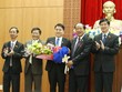 Lãnh đạo tỉnh Quảng Nam chúc mừng ông Trần Văn Tân (giữa).