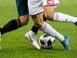 Hai cầu thủ đi giày Adidas và Nike tại World Cup năm nay. Ảnh: TASS.