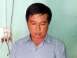 Một trong số ba cán bộ địa chính xã bị bắt. Ảnh: Nguyễn Hằng.