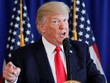 Tổng thống Donald Trump phát biểu trước khi ký một đạo luật ở Bedminster, New Jersey ngày 12/8/2017. Ảnh: Reuters.