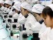 Công nhân Trung Quốc trong một nhà máy Kl994 nhà cái bóng đá world cup điện thoại tại An Huy. Ảnh: AFP.