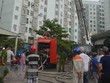Hiện trường vụ cháy chung cư 12T5 Nại Hiên Đông. (Ảnh: Đinh Văn Nhiều/TTXVN).