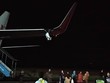 Cánh trái máy bay mang số hiệu JT633 của hãng hàng không Indonesia Lion Air bị vỡ sau khi đâm vào cột ở sân bay Fatmawati. Ảnh: CNA. 