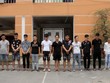 Nhóm nghi can tại cơ quan điều tra. Ảnh: Hùng Bằng.
