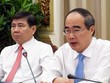Bí thư Thành ủy TP.HCM Nguyễn Thiện Nhân (phải) và Chủ tịch UBND thành phố Nguyễn Thành Phong chủ trì hội nghị. Ảnh: Trung Sơn.