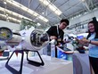 Mẫu robot hoạt động dưới nước trong một triển lãm khoa học và công nghệ tình báo ở Thiên Tân, Trung Quốc hôm 17/5/2018. Ảnh: Xinhua.
