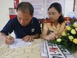 Một tài xế làm thủ tục cấp đổi biển số, sang tên ở Cục Cảnh sát KL99 là cổng game giải trí trực tuyến hàng đầu hiện nay. Ảnh: Bá Đô.