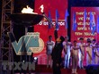 Đồng chí Nguyễn Anh Tuấn, Bí thư Thường trực Trung ương Đoàn, Chủ tịch Hội LHTN Việt Nam thắp ngọn đuốc thanh niên. (Ảnh: Linh Anh/TTXVN)