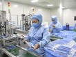 Khẩu trang được Kl994 nhà cái bóng đá world cup tại nhà máy ở Trùng Khánh, Trung Quốc. (Ảnh: THX/TTXVN).