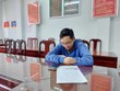H. tại cơ quan công an. (Nguồn: TTXVN phát).