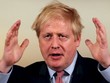 Johnson họp báo về Covid-19 tại Văn phòng Thủ tướng Anh hôm 12/3. Ảnh: Reuters.