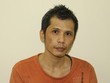 Nguyễn Hoài Nam tại cơ quan điều tra. Ảnh: Công an cung cấp.