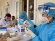 Xét nghiệm nhanh COVID-19. (Ảnh: Vũ Sinh/TTXVN).