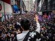 Người dân xuống đường biểu tình tại Hong Kong. (Ảnh: AFP).