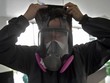 Bác sĩ đeo đồ bảo hộ ở Colombia ngày 24/7. Ảnh: AFP.