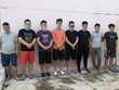 Các đối tượng bị bắt giữ khi chuẩn bị xuất cảnh trái phép qua biên giới. (Ảnh: Thanh Tân/TTXVN).