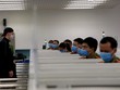 Người nước ngoài làm thủ tục nhập cảnh vào cửa khẩu sân bay Nội Bài hồi tháng 3/2020. 