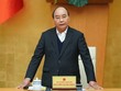Thủ tướng Nguyễn Xuân Phúc: Tạm dừng các chuyến bay thương mại. Ảnh VGP/Quang Hiếu.