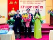 Bí thư Tỉnh ủy, Chủ tịch HĐND tỉnh Quảng Ngãi Bùi Thị Quỳnh Vân (phải) và Chủ tịch UBND tỉnh Đặng Văn Minh (trái) chúc mừng Phó chủ tịch UBND tỉnh Trần Phước Hiền. (Ảnh: Đinh Hương/TTXVN).