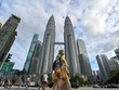 Người dân đeo khẩu trang phòng lây nhiễm COVID-19 tại Kuala Lumpur, Malaysia, ngày 11/1/2021. (Ảnh: THX/TTXVN).