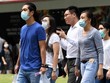 Nhân viên văn phòng Singapore thời Covid-19. Ảnh: AFP.