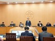 Phó Chủ tịch Ủy ban nhân dân thành phố Hà Nội Chử Xuân Dũng họp với các cơ quan chức năng về công tác phòng chống dịch bệnh. (Ảnh: PV/Vietnam+).