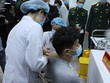 Mũi tiêm vắcxin Nano Covax ngừa COVID-19 đầu tiên trên người tình nguyện tại Việt Nam. (Ảnh: Minh Quyết/TTXVN)