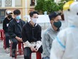 Thanh niên nhập ngũ đến xét nghiệm phải thực hiện đúng nguyên tắc 5K của Bộ Y tế. (Ảnh: Văn Dũng/TTXVN).