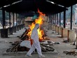 Hơn 2,5 triệu người trên thế giới tử vong vì Covid-19. (Ảnh minh họa: Reuters).
