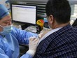 Tiêm vắcxin ngừa COVID-19. (Nguồn: AFP).