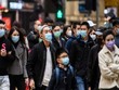 Đeo khẩu trang ở Trung Quốc thời Covid-19. Ảnh: DNA India.