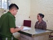 Đối tượng Ngô Thị Lý tại cơ quan điều tra. (Ảnh: C.A).