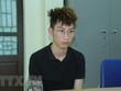 Đối tượng Vũ Minh Toàn tại cơ quan công an. (Ảnh: TTXVN phát).