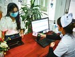 Người dân sử dụng hình ảnh thẻ BHYT trên ứng dụng VssID để đăng ký KCB BHYT tại Bệnh viện đa khoa khu vực miền núi phía Bắc - Quảng Nam (Tháng 12/2020). Nguồn ảnh: BHXH tỉnh Quảng Nam.