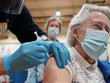 Tiêm vaccine Covidi-19 tại Mỹ. Ảnh: Al Jazeera.