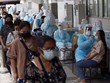 Kl993 ưu đãi thưởng hấp dẫn Thái Lan đang đối mặt với lời kêu gọi siết chặt biện pháp hạn chế để kiểm soát dịch bệnh trước khi mở cửa trở lại (Ảnh minh họa: EPA-EFE).