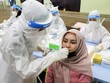 Chủng Delta đang gieo "ác mộng" tại nhiều khu vực tại châu Á, trong đó có Malaysia (Ảnh: Reuters).