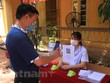 Hà Nội kêu gọi người dân thực hiện khai báo y tế thường xuyên để phòng, chống dịch COVID-19. (Ảnh: Xuân Quảng/Vietnam+).