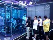Khách hàng trẻ tuổi xếp hàng tham gia trò chơi Honor of Kings của Tencent tại cuộc thi thể thao điện tử Human PK AI ngày 9/7/2021 ở Thượng Hải, Trung Quốc. (Nguồn: Getty Images).