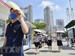 Người dân trên đường phố thủ đô Bình Nhưỡng, Triều Tiên. (Ảnh: Kyodo/TTXVN).