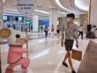 Người dân đeo khẩu trang phòng lây nhiễm COVID-19 tại Bangkok, Thái Lan, ngày 26/4/2021. (Ảnh: AFP/TTXVN).