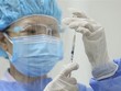 Tiêm vaccine phòng COVID-19 của hãng Pfizer. (Ảnh: Minh Quyết/TTXVN).