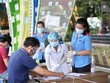 Khai báo y tế tại tỉnh Tây Ninh. (Ảnh: Thanh Tân/TTXVN).