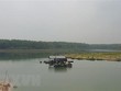 Nhà bè trên lòng hồ Dầu Tiếng tại ấp Hòa Lộc, xã Minh Hòa, huyện Dầu Tiếng, tỉnh Bình Dương. (Ảnh: Huyền Trang/TTXVN).