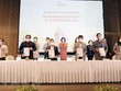 Đại diện các Kl991.com World Cup 2026 Chính Thức du lịch, công ty lữ hành ký kết hợp tác. (Ảnh: Mỹ Phương/TTXVN).