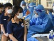 Học sinh trường Bùi Thị Xuân ở thành phố Biên Hòa (Đồng Nai) được tiêm vaccine phòng COVID-19. (Ảnh: Công Phong/TTXVN).