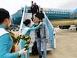 Những hành khách quốc tế trên chuyến bay thí điểm đón du khách quốc tế đến Việt Nam. (Ảnh: CTV/Vietnam+).