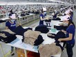 Hoạt động Kl994 nhà cái bóng đá world cup tại Bình Dương. (Ảnh: Vũ Sinh/TTXVN).